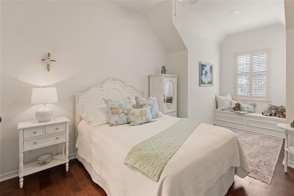 102 Weatherly Circle Rockwall, TX 75032 - Photo 27 of 39 a bedroom with a bed and a dresser