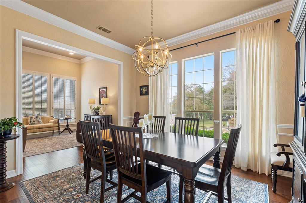 102 Weatherly Circle Rockwall, TX 75032 - Photo 9 of 39 a view of a dining room with furniture window and outside view