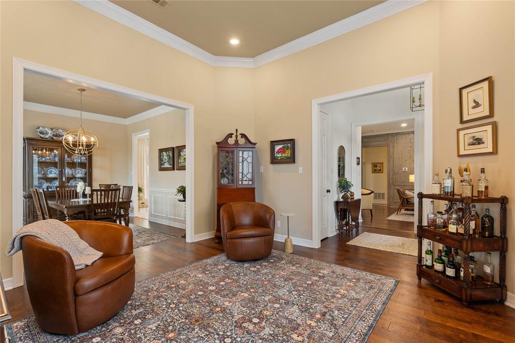 102 Weatherly Circle Rockwall, TX 75032 - Photo 10 of 39 a living room with furniture and wooden floor