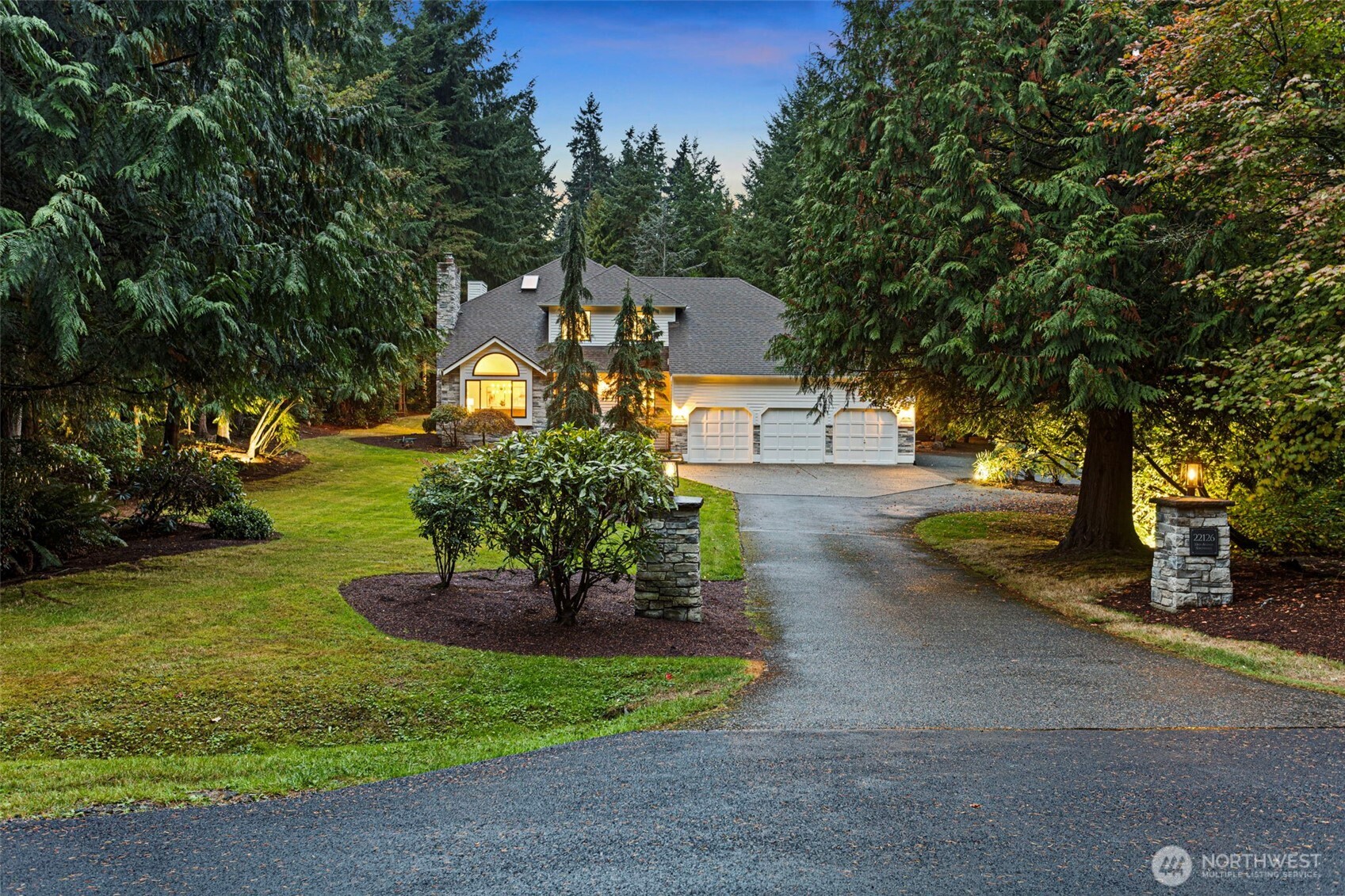 22126 53rd Avenue Southeast Bothell, WA 98021 - Photo 1 of 40 a front view of a house with a yard