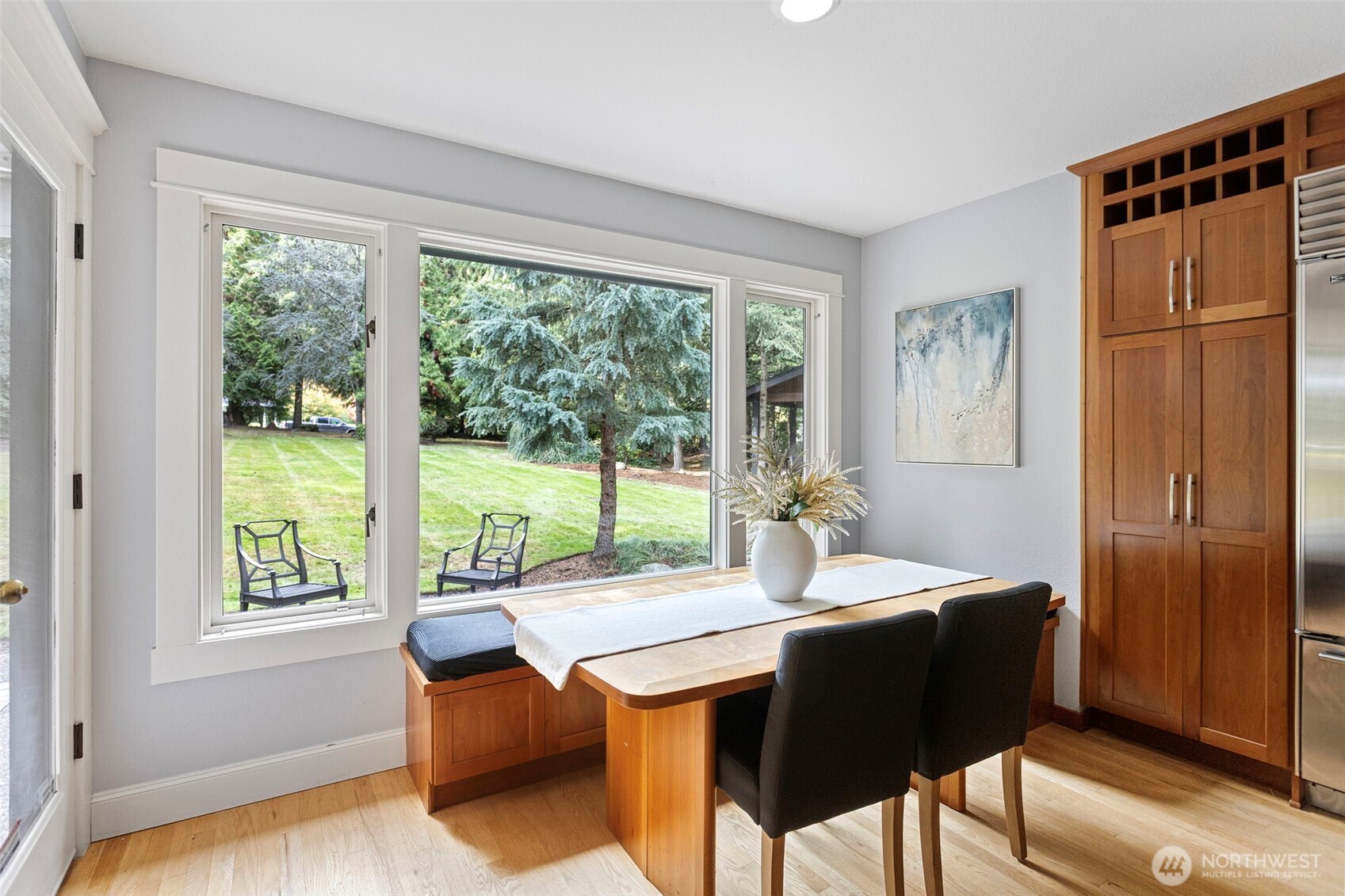 22126 53rd Avenue Southeast Bothell, WA 98021 - Photo 13 of 40 a view of a dining room with furniture window and outside view