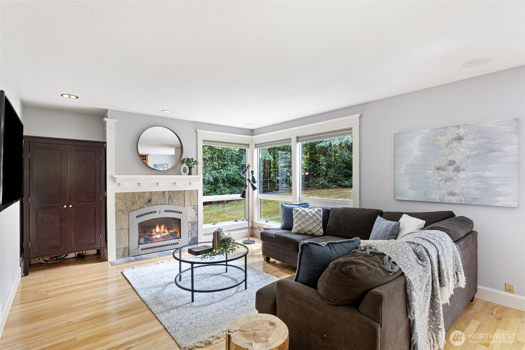 22126 53rd Avenue Southeast Bothell, WA 98021 - Photo 14 of 40 a living room with furniture a window and a fireplace