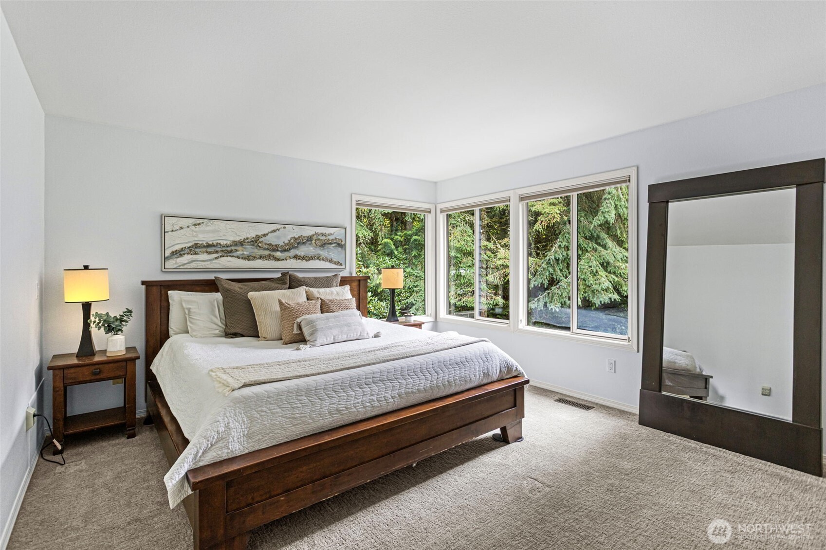 22126 53rd Avenue Southeast Bothell, WA 98021 - Photo 17 of 40 a bed sitting in a bedroom next to a window