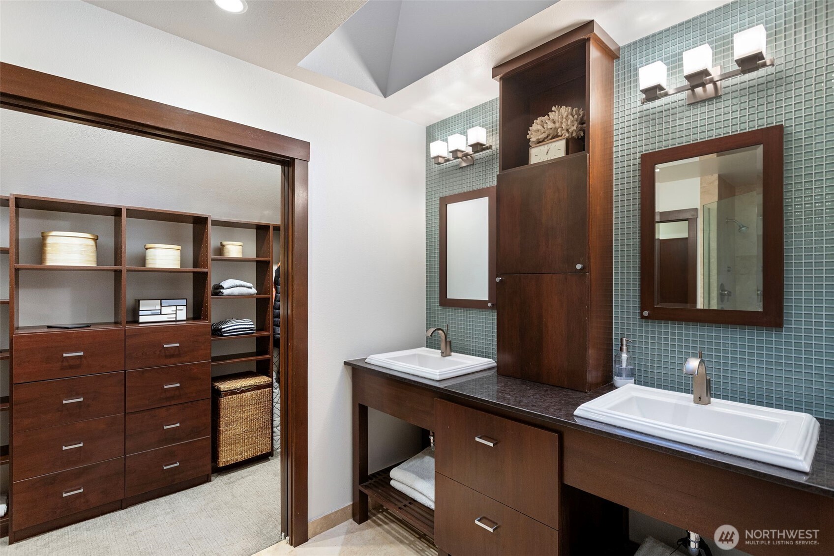 22126 53rd Avenue Southeast Bothell, WA 98021 - Photo 21 of 40 a bathroom with a sink vanity and a mirror
