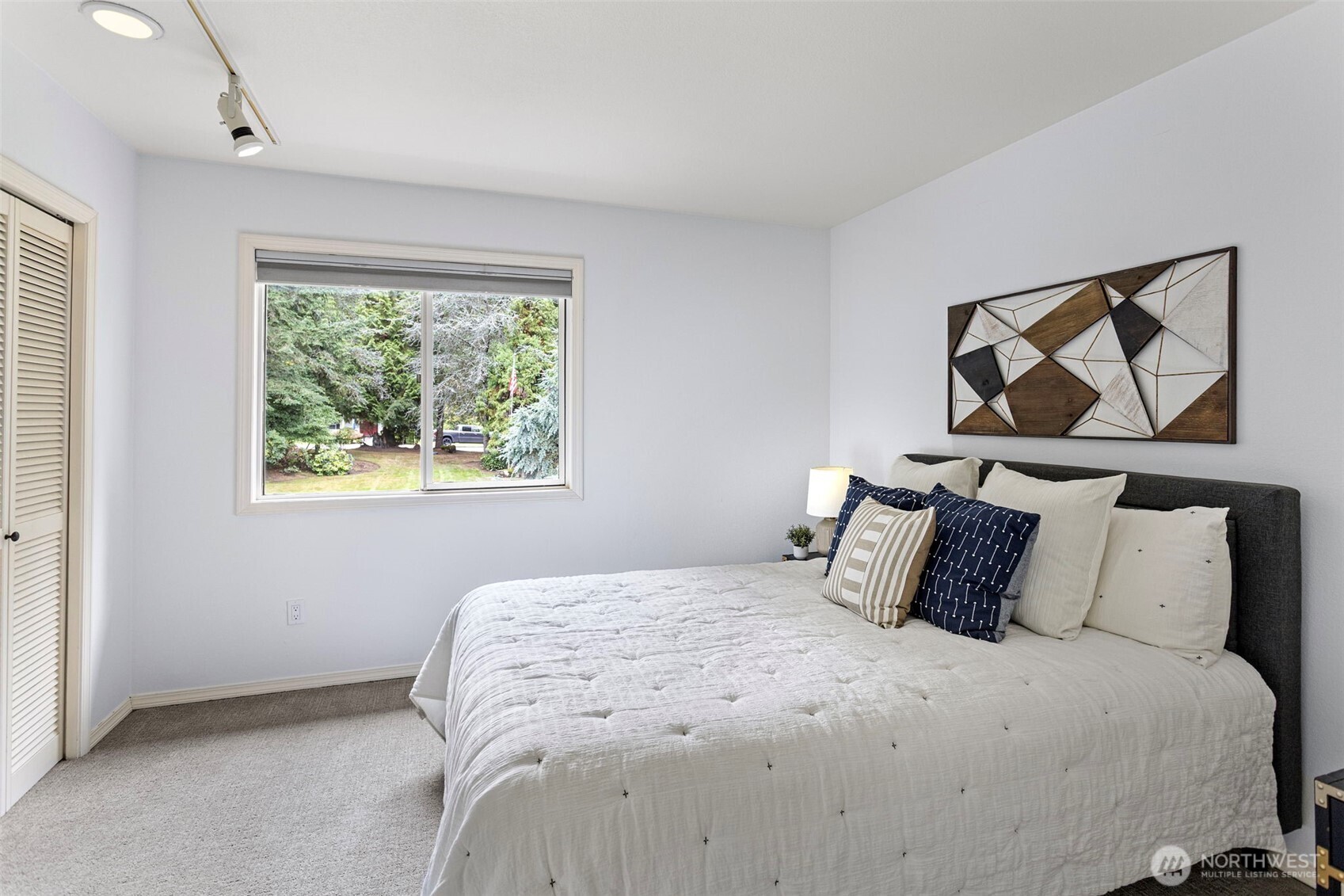 22126 53rd Avenue Southeast Bothell, WA 98021 - Photo 24 of 40 a bedroom with a bed and window