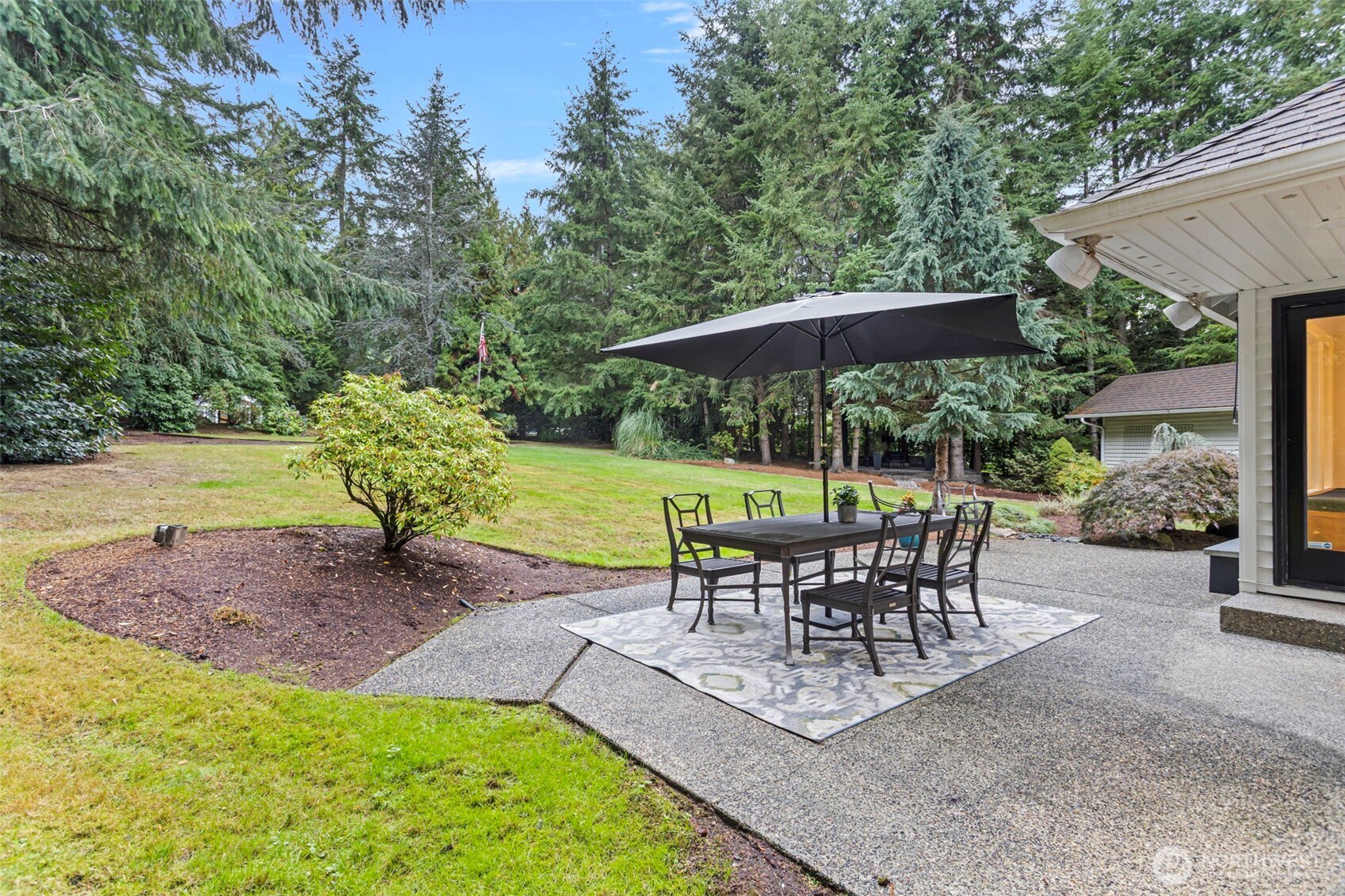 22126 53rd Avenue Southeast Bothell, WA 98021 - Photo 29 of 40 a view of a backyard with sitting area and furniture