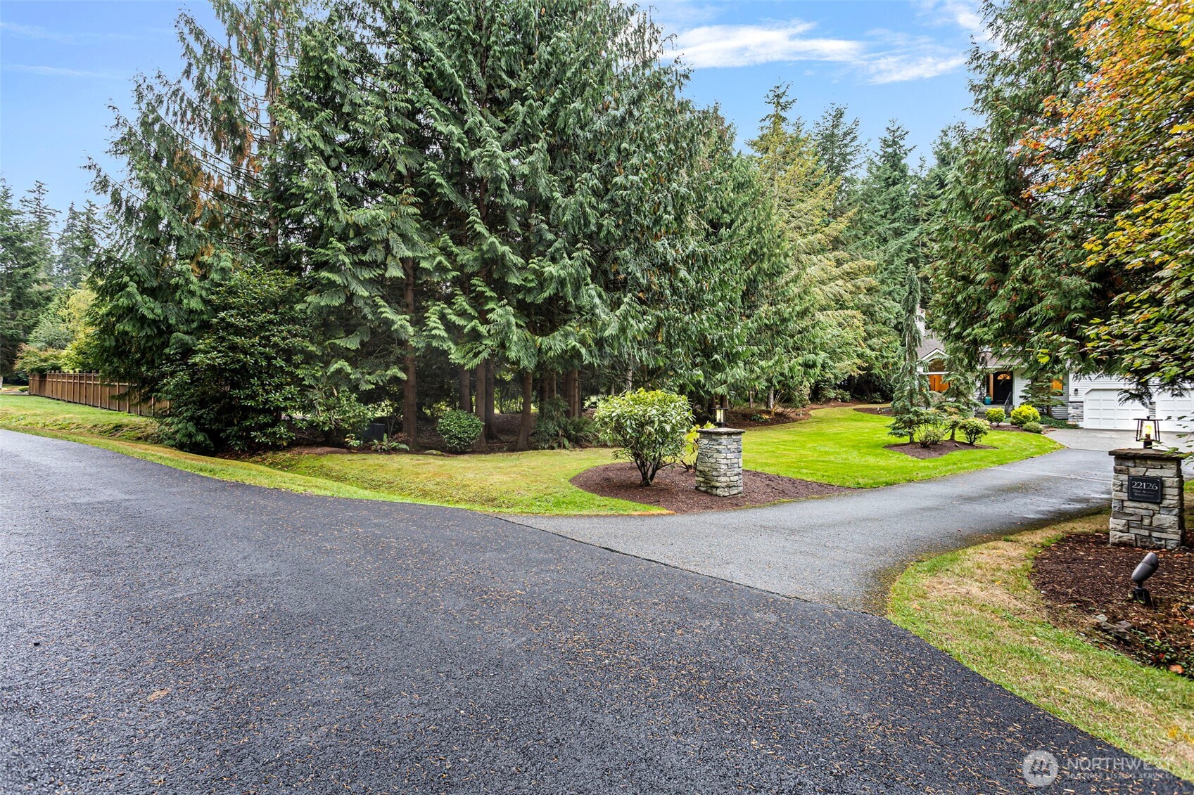 22126 53rd Avenue Southeast Bothell, WA 98021 - Photo 3 of 40 a view of a swimming pool with a yard