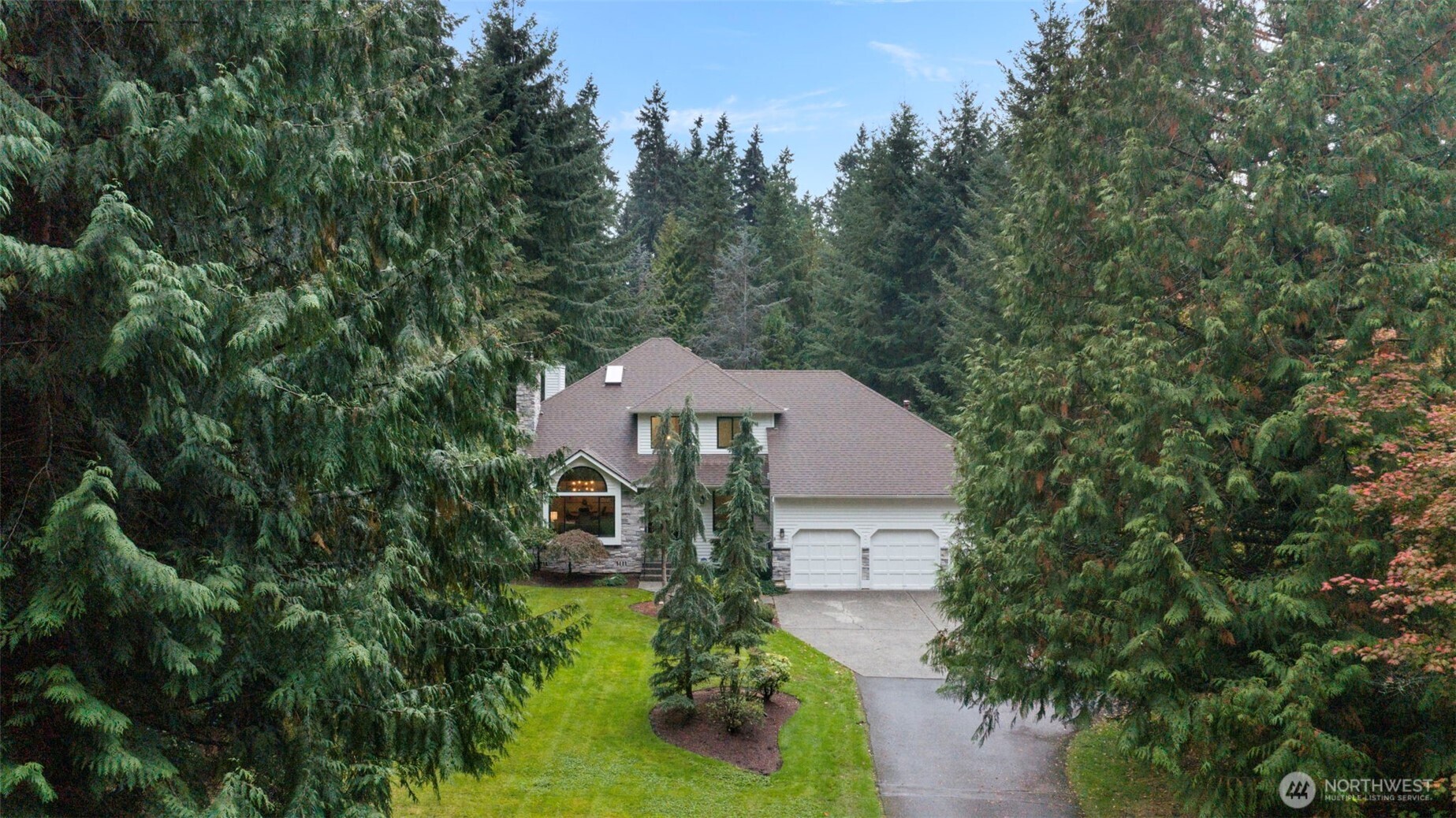 22126 53rd Avenue Southeast Bothell, WA 98021 - Photo 4 of 40 a front view of a house with garden