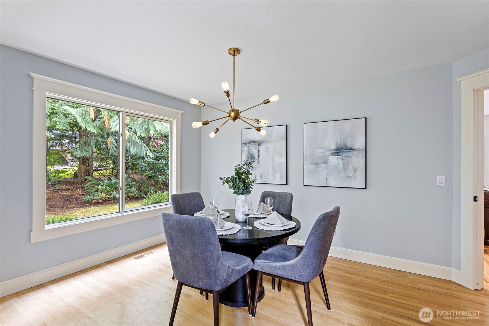 22126 53rd Avenue Southeast Bothell, WA 98021 - Photo 9 of 40 a dining room with furniture a window and wooden floor