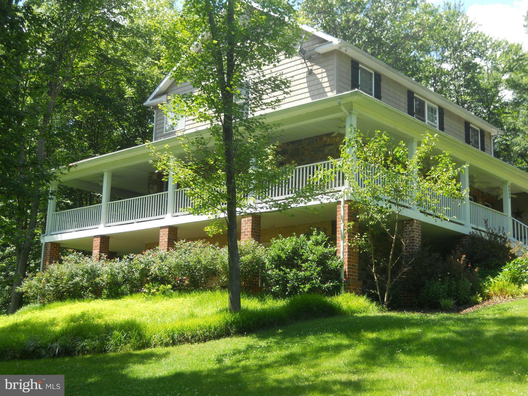 2888 Barrick Road Finksburg, MD 21048 - Photo 19 of 29 a view of a garden in front of a house