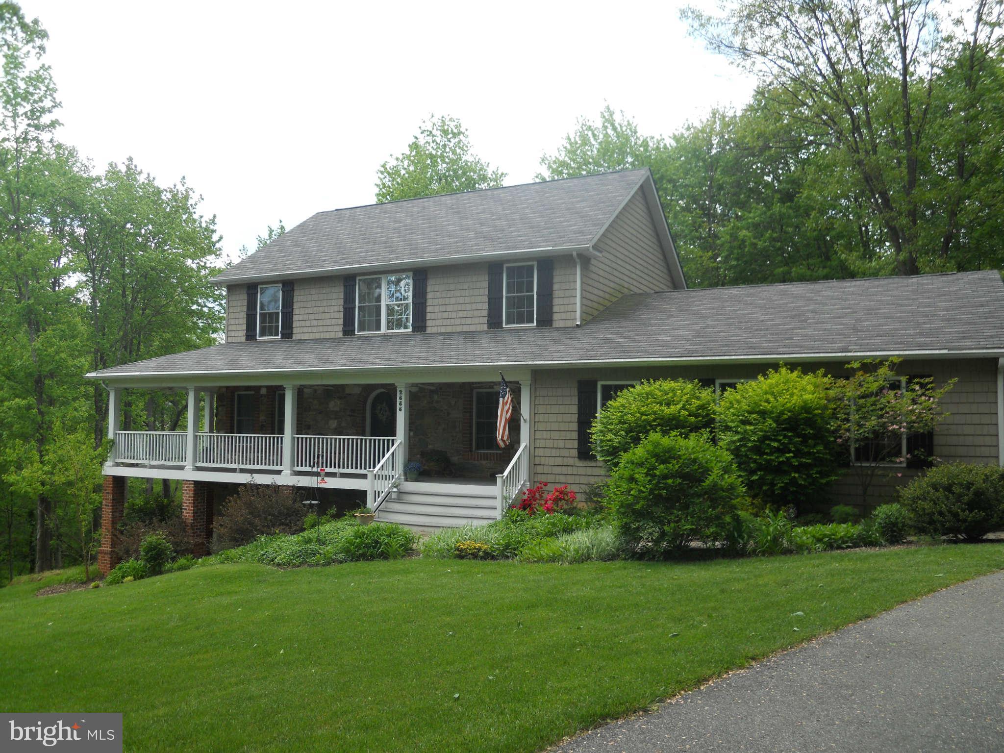 2888 Barrick Road Finksburg, MD 21048 - Photo 3 of 29 a front view of a house with a yard