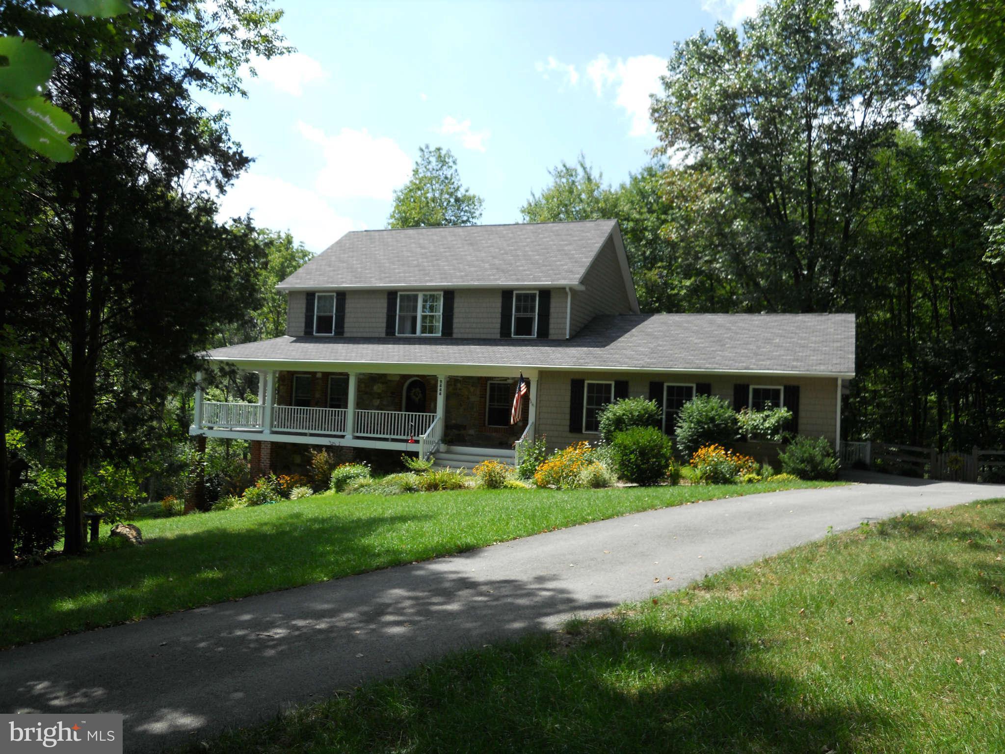 2888 Barrick Road Finksburg, MD 21048 - Photo 28 of 29 a front view of a house with a yard