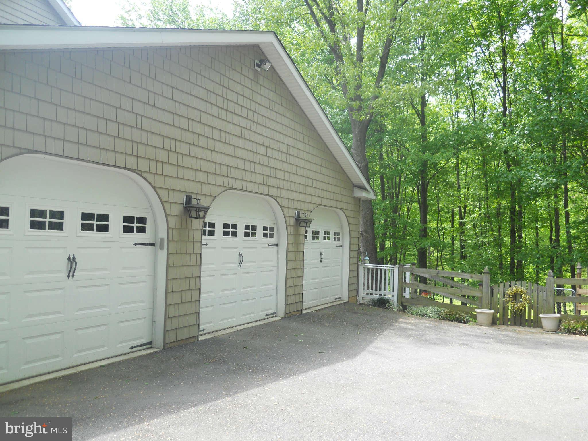 2888 Barrick Road Finksburg, MD 21048 - Photo 4 of 29 a view of a house with a garage
