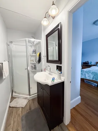 a bathroom with a sink and a mirror