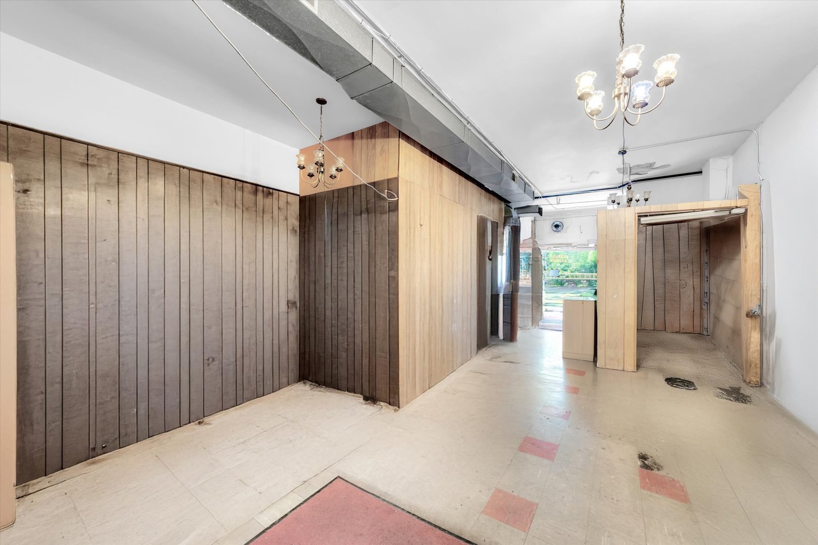 18660 Dixie Highway Homewood, IL 60430 - Photo 11 of 53 a view of a livingroom with a chandelier fan