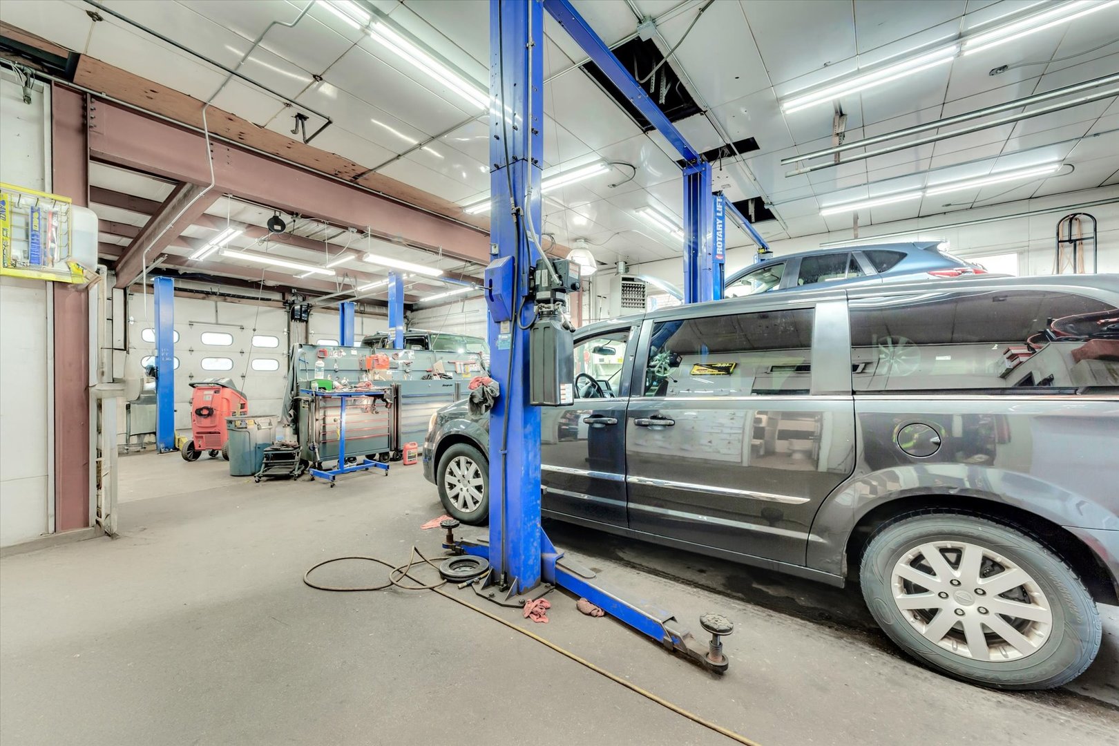 18660 Dixie Highway Homewood, IL 60430 - Photo 37 of 53 a view of parking garage with cars and other equipment