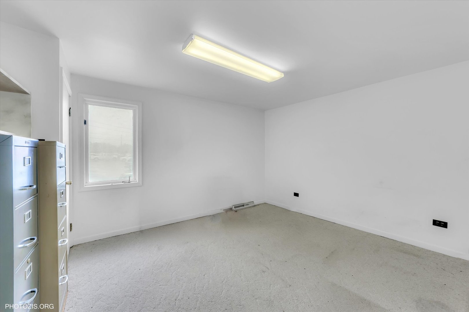 18660 Dixie Highway Homewood, IL 60430 - Photo 43 of 53 an empty room with a window