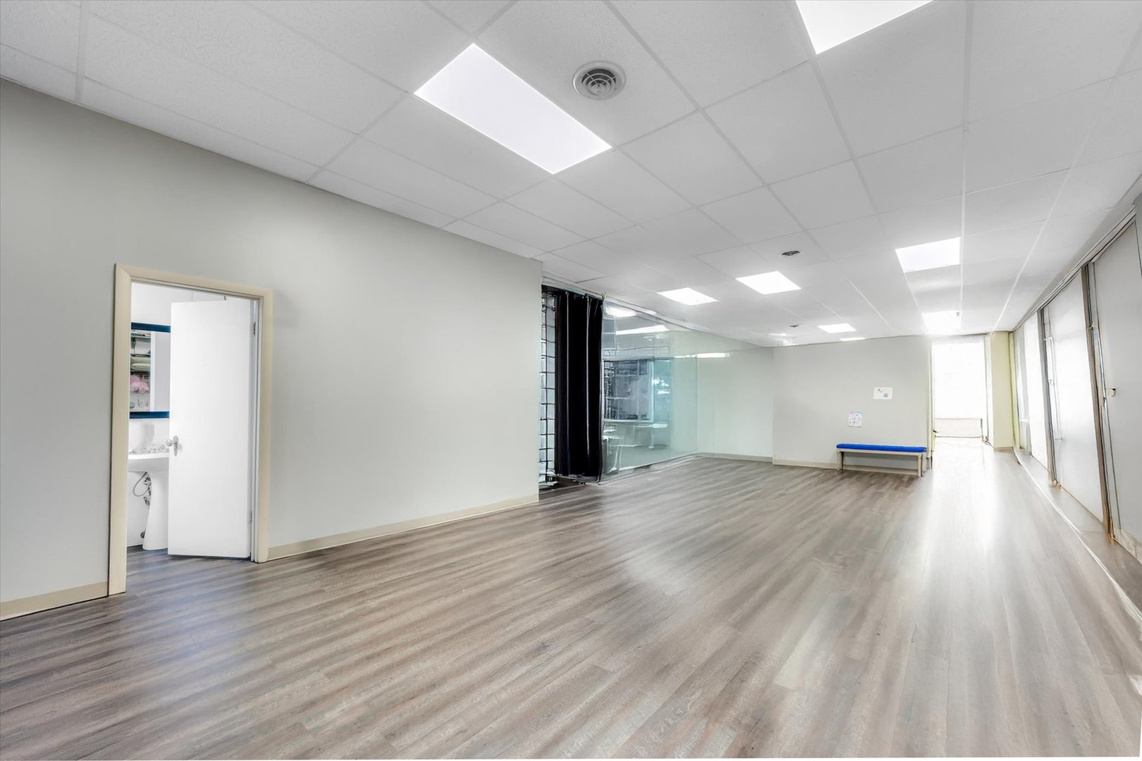18660 Dixie Highway Homewood, IL 60430 - Photo 5 of 53 a view of a hallway with wooden floor