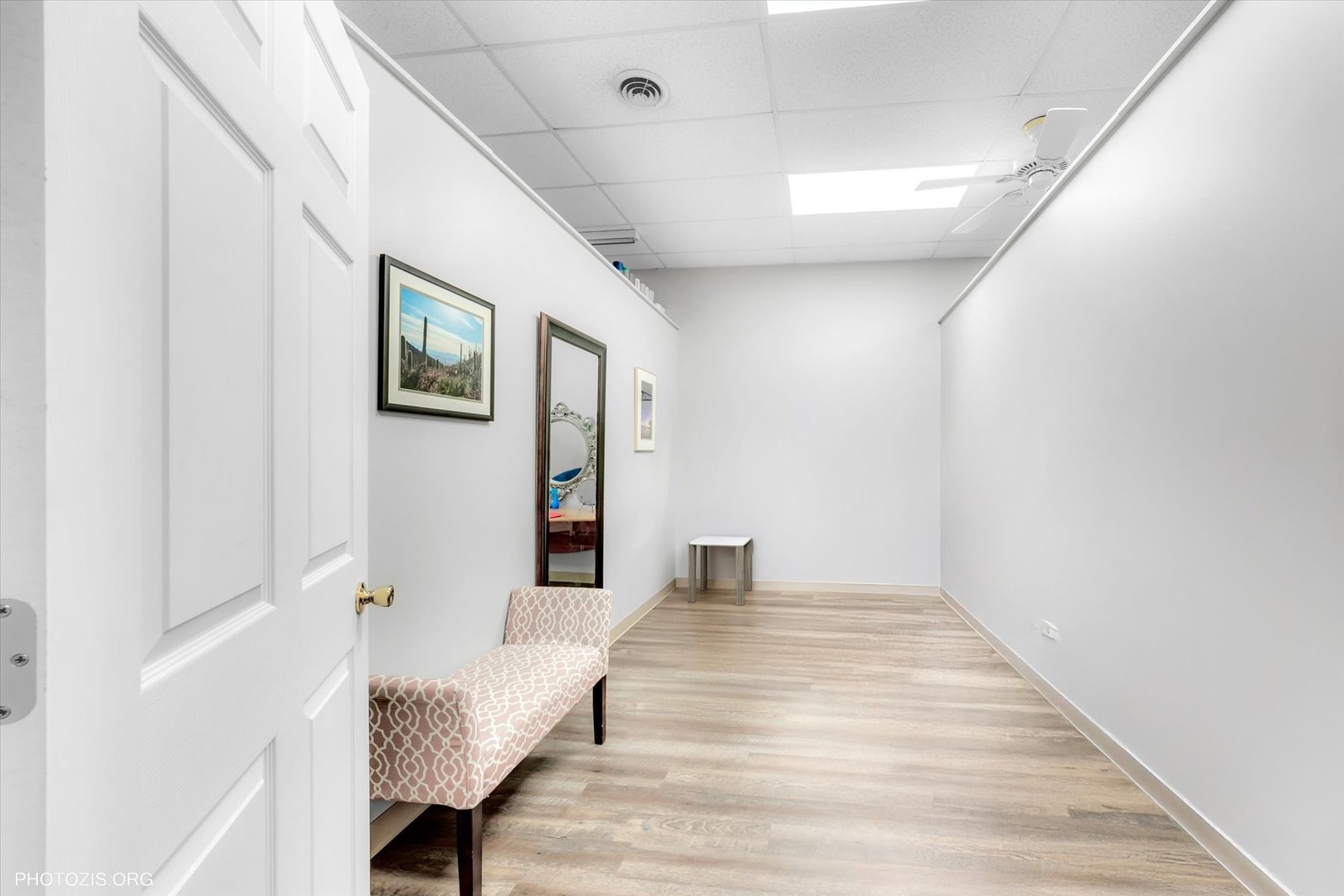 18660 Dixie Highway Homewood, IL 60430 - Photo 8 of 53 a view of a hallway with wooden floor and a bathroom
