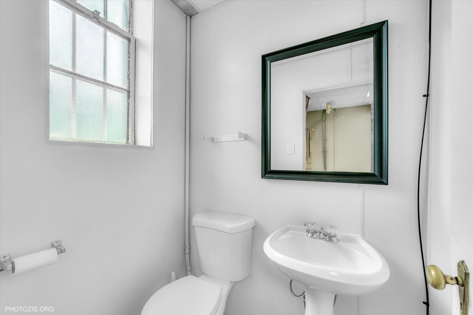 18660 Dixie Highway Homewood, IL 60430 - Photo 9 of 53 a bathroom with a toilet sink and mirror