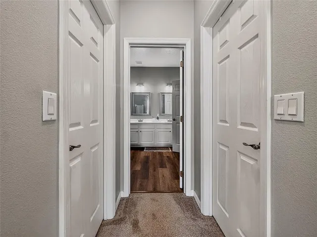a bathroom with a sink a mirror and a shower