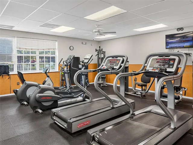 a view of a swimming pool with a lounge chairs