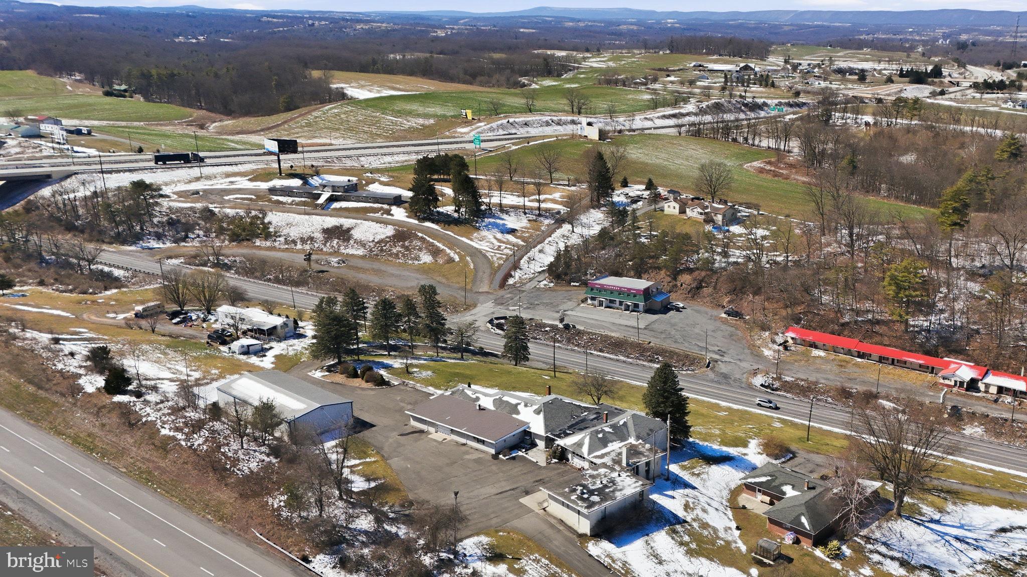 501 South Breezewood Road Breezewood, PA 15533 - Photo 11 of 43 an aerial view of residential houses with outdoor space