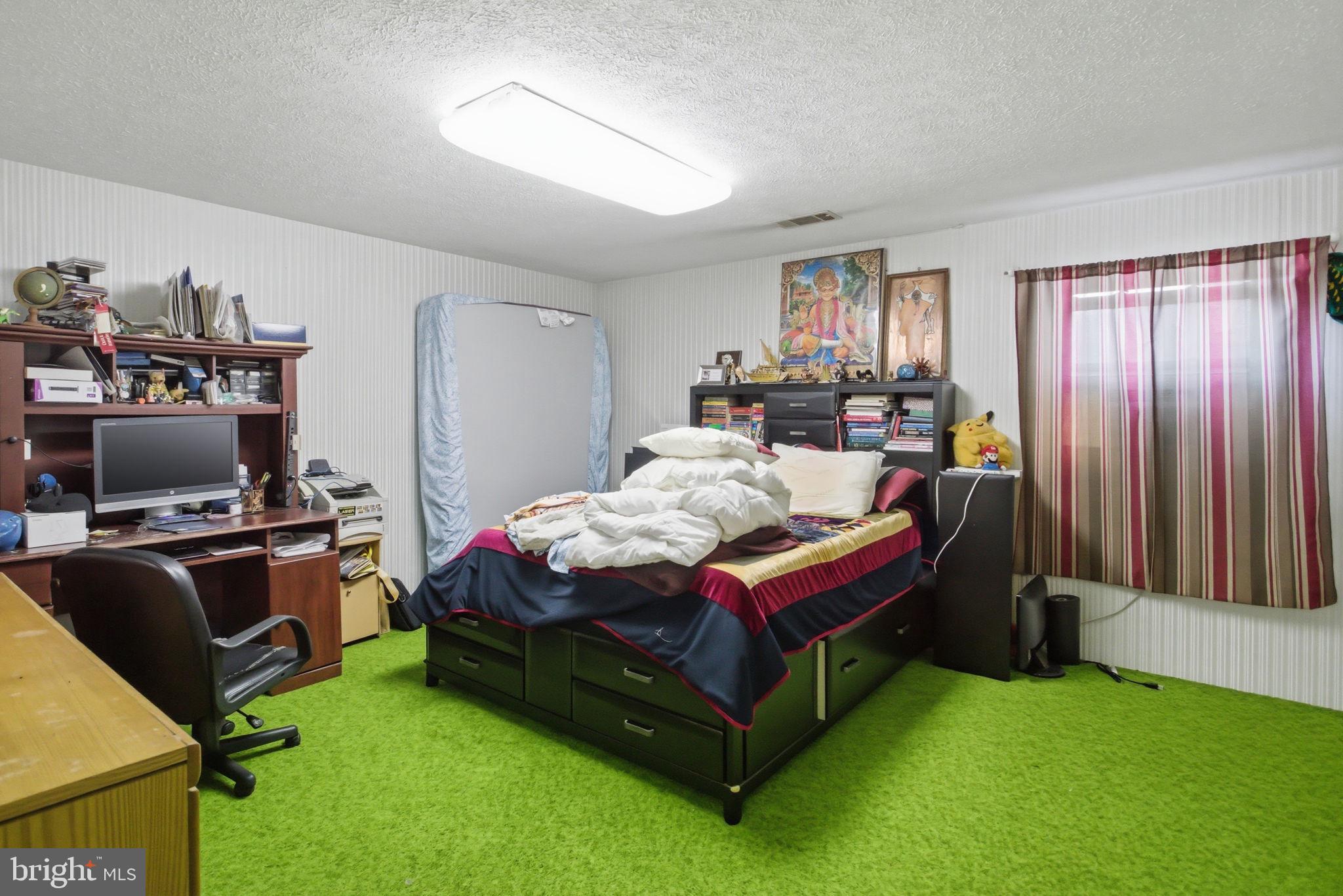 501 South Breezewood Road Breezewood, PA 15533 - Photo 23 of 43 a bed room with a bed and a window