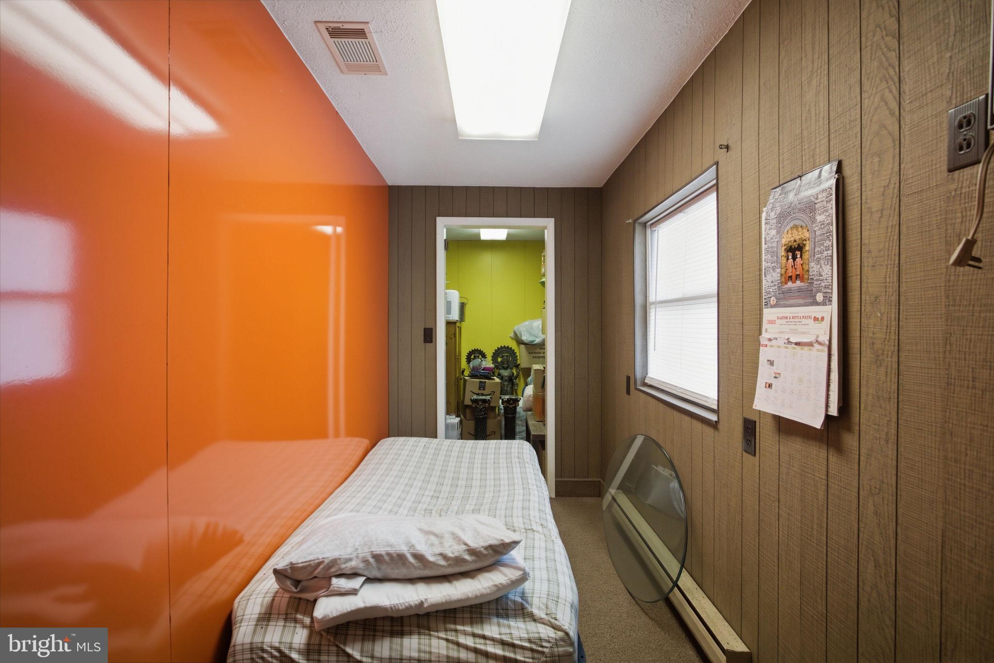 501 South Breezewood Road Breezewood, PA 15533 - Photo 25 of 43 a bedroom with a bed and a window
