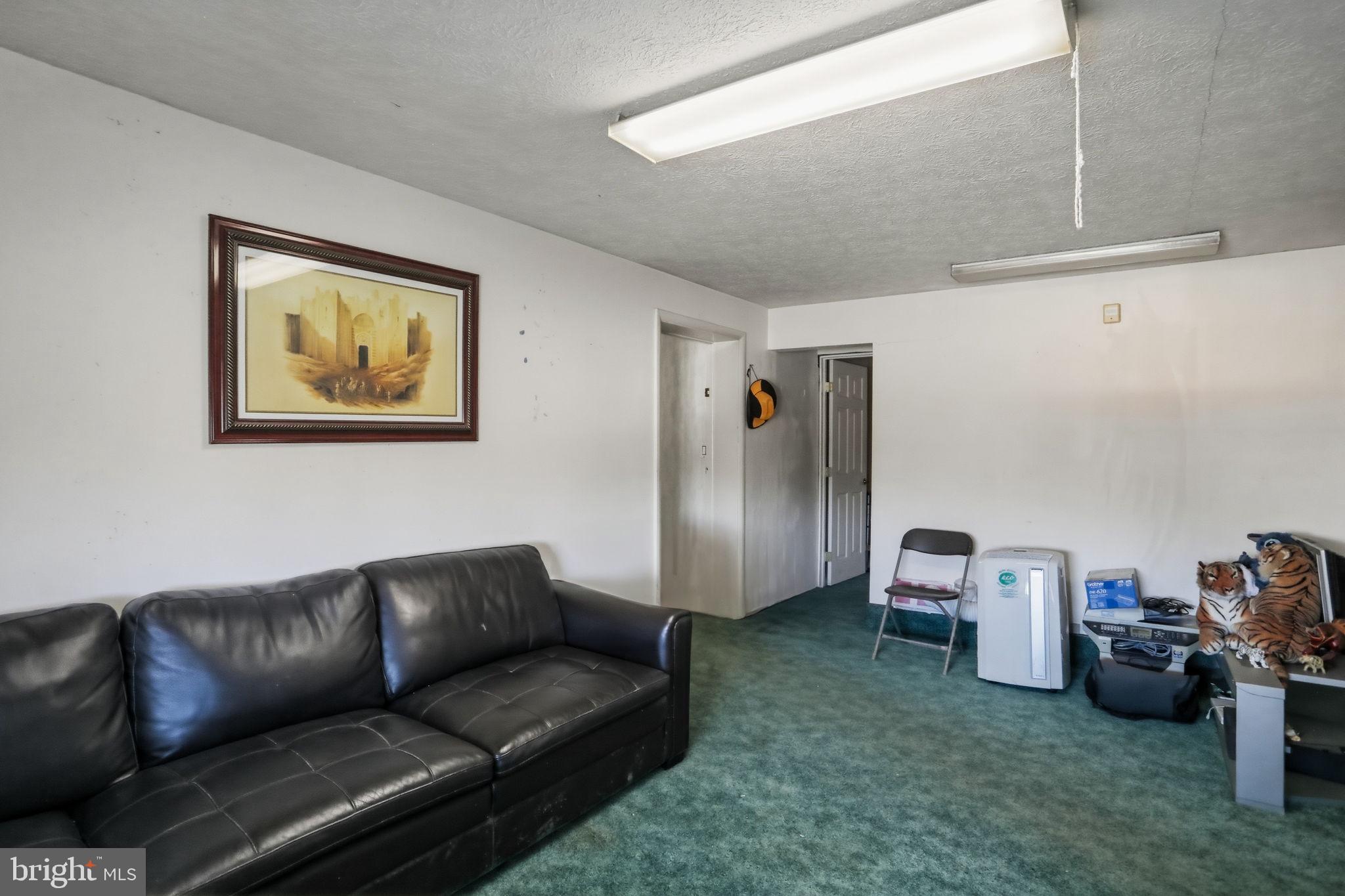 501 South Breezewood Road Breezewood, PA 15533 - Photo 38 of 43 a living room with furniture and a couch
