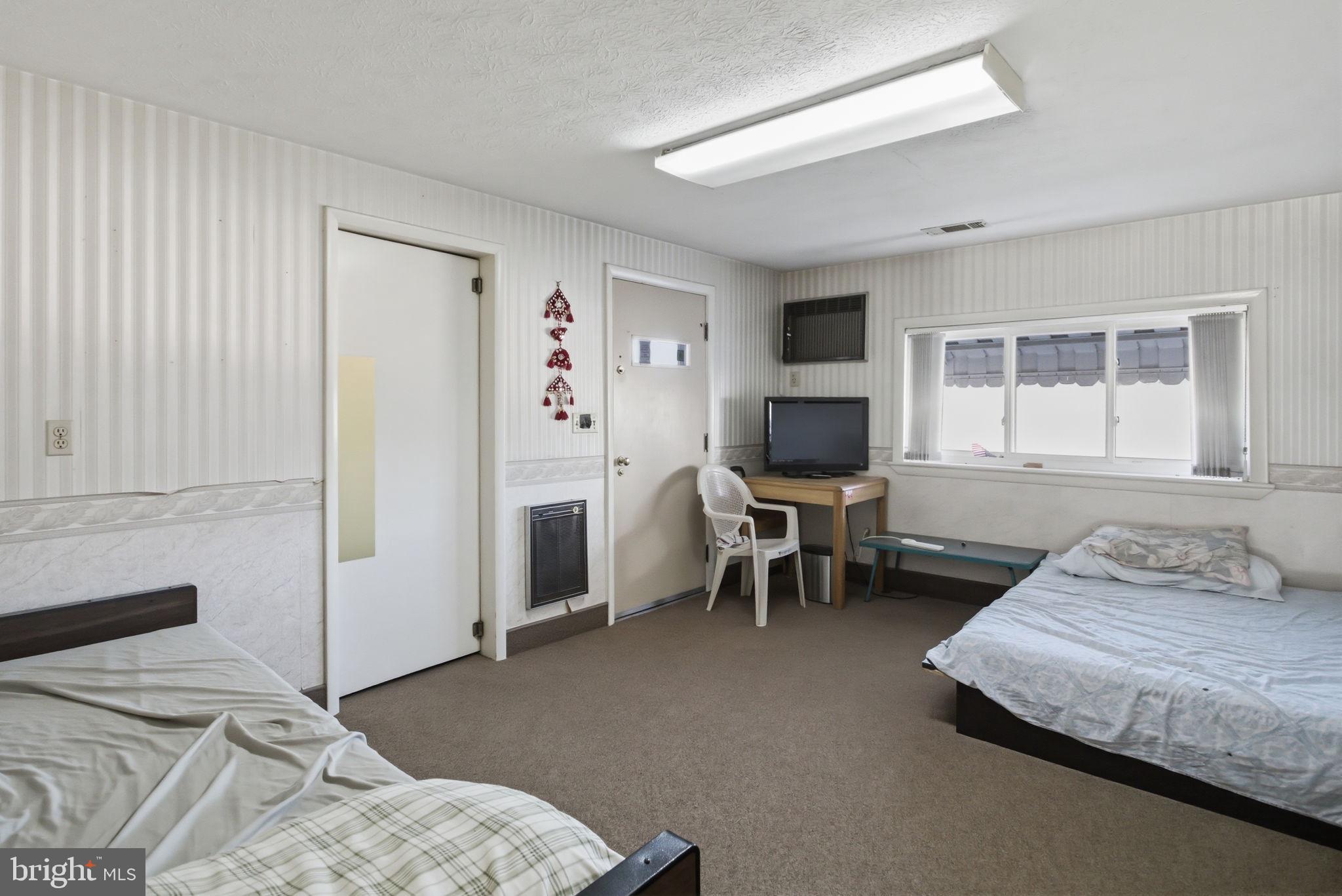 501 South Breezewood Road Breezewood, PA 15533 - Photo 41 of 43 a bedroom with a bed and a chair