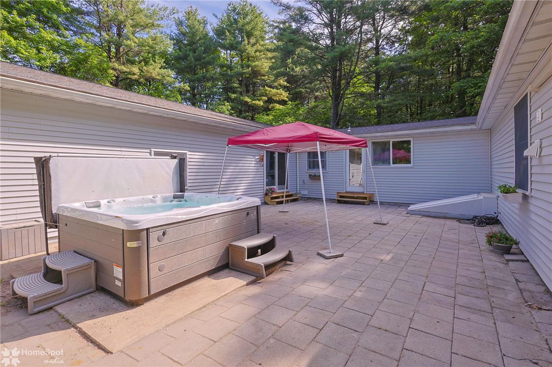 60 Sassafras Road Lehighton, PA 18235 - Photo 14 of 51 Indulge in relaxation on this private patio featuring a ready-to-use hot tub.