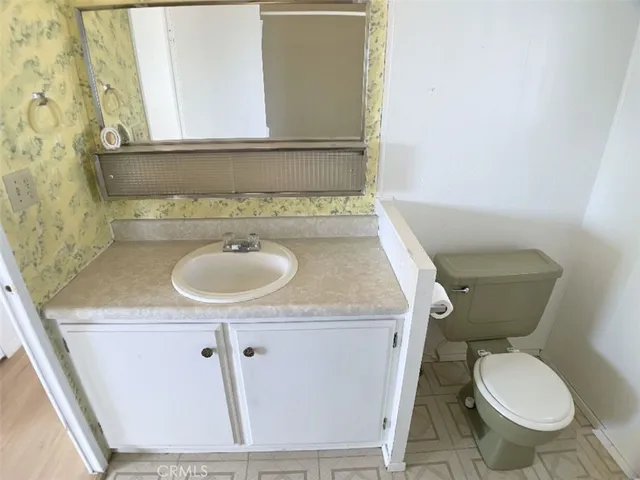 a bathroom with a sink and a toilet