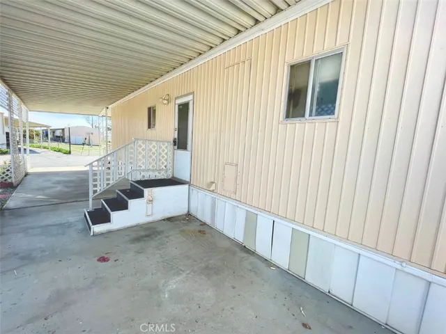 a view of backyard with large trees