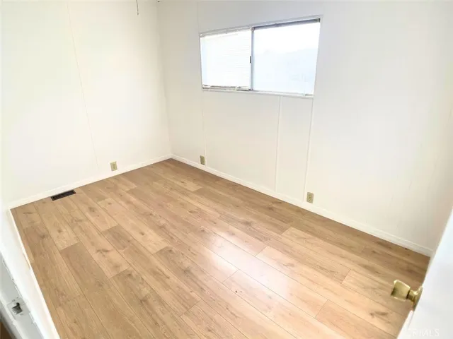 a view of a room that has a window