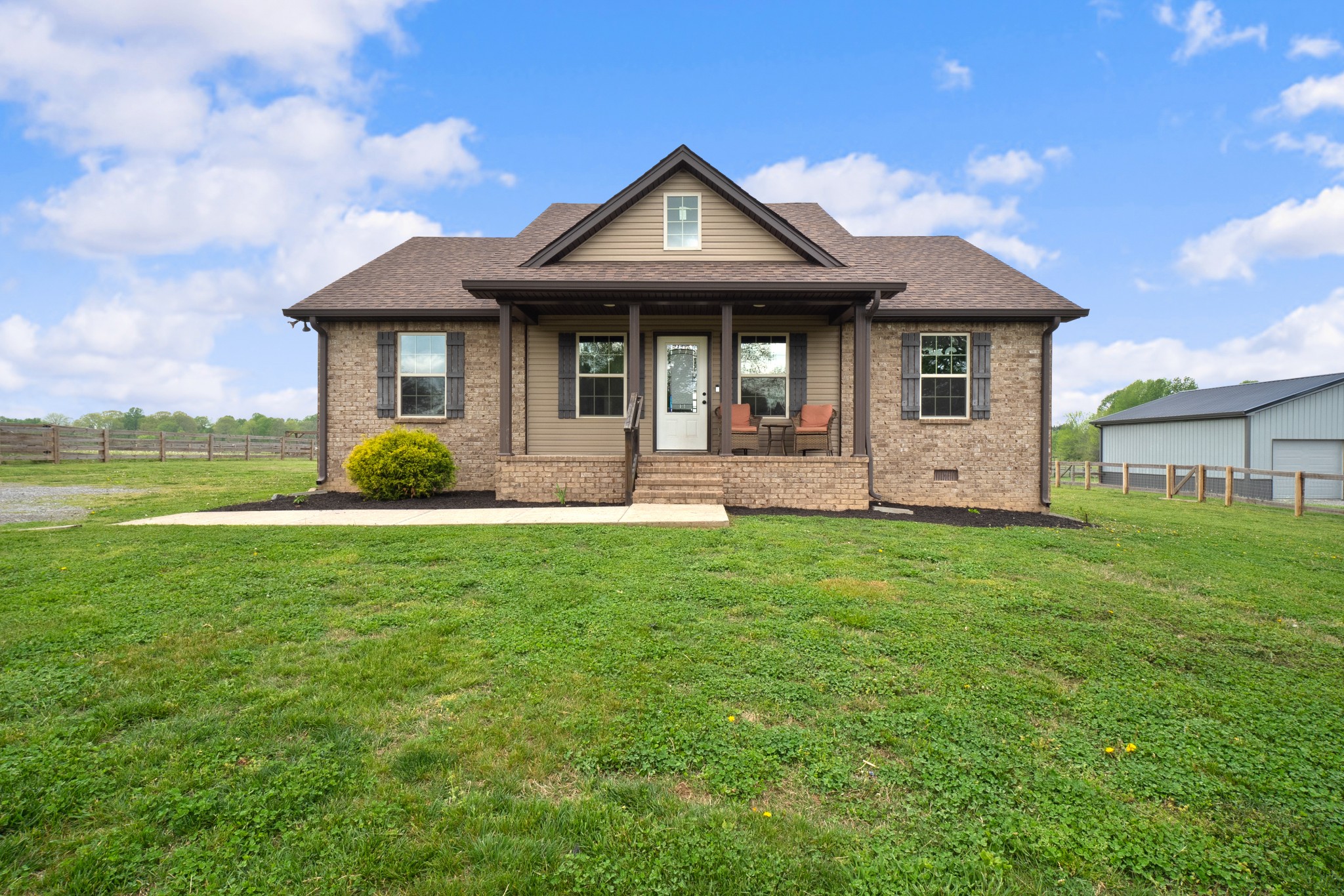 1010 Gil Hodges Road Portland, TN 37148 - Photo 1 of 22 a front view of a house with garden