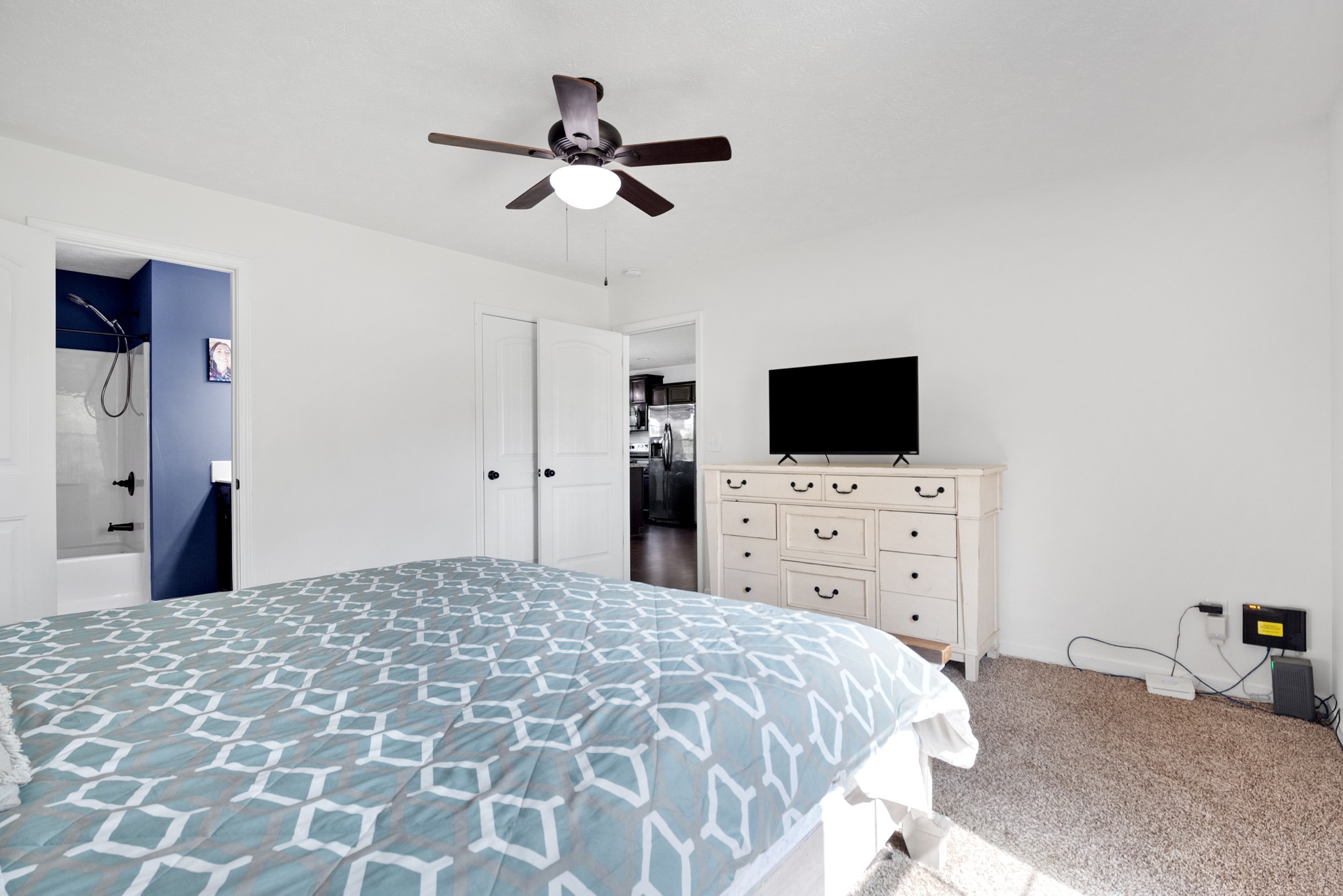 1010 Gil Hodges Road Portland, TN 37148 - Photo 11 of 22 a bedroom with a bed and a flat screen tv