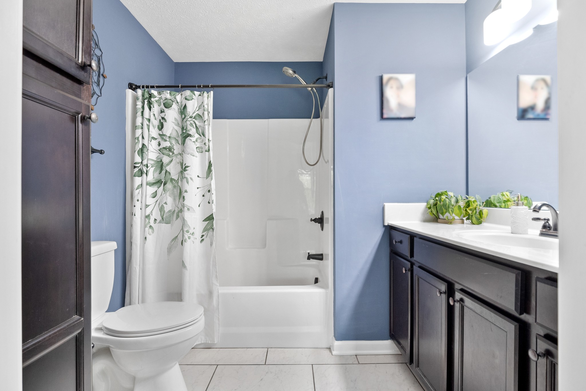 1010 Gil Hodges Road Portland, TN 37148 - Photo 12 of 22 a bathroom with a sink toilet and shower