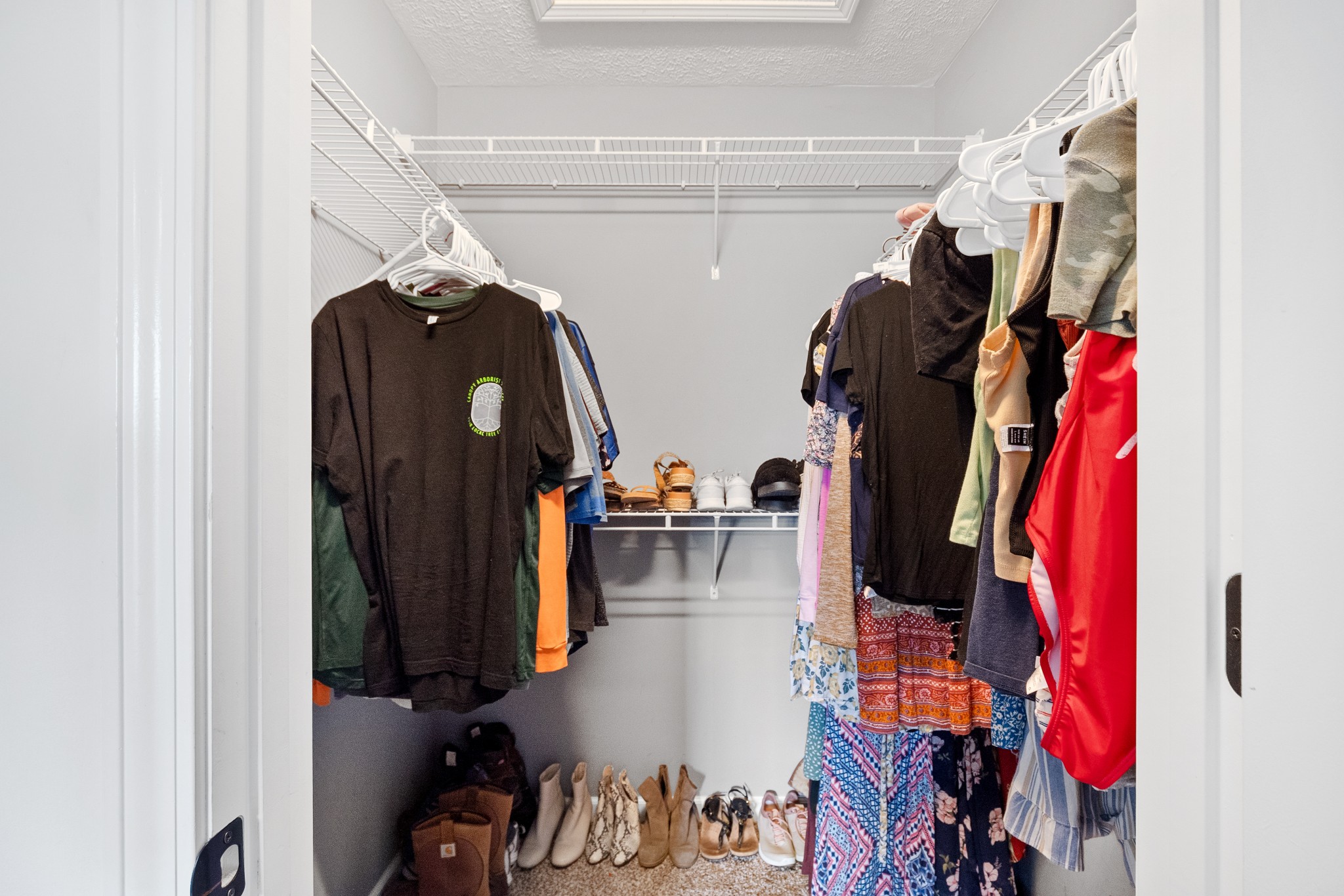 1010 Gil Hodges Road Portland, TN 37148 - Photo 13 of 22 a view of walk in closet with clothes and shoes