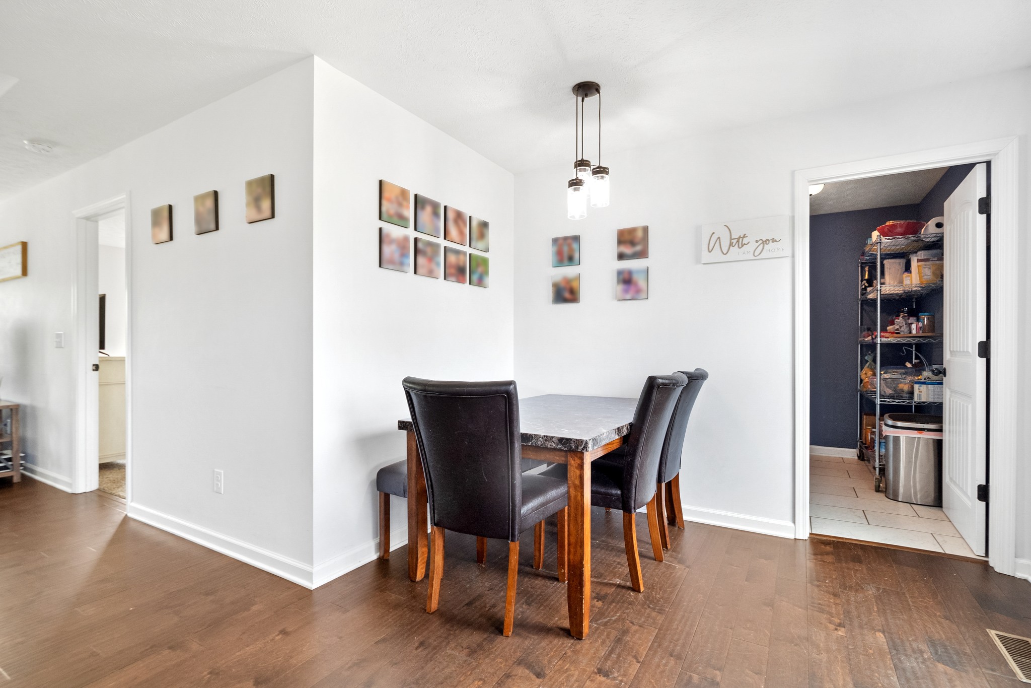 1010 Gil Hodges Road Portland, TN 37148 - Photo 8 of 22 a view of a dining room with furniture and wooden floor