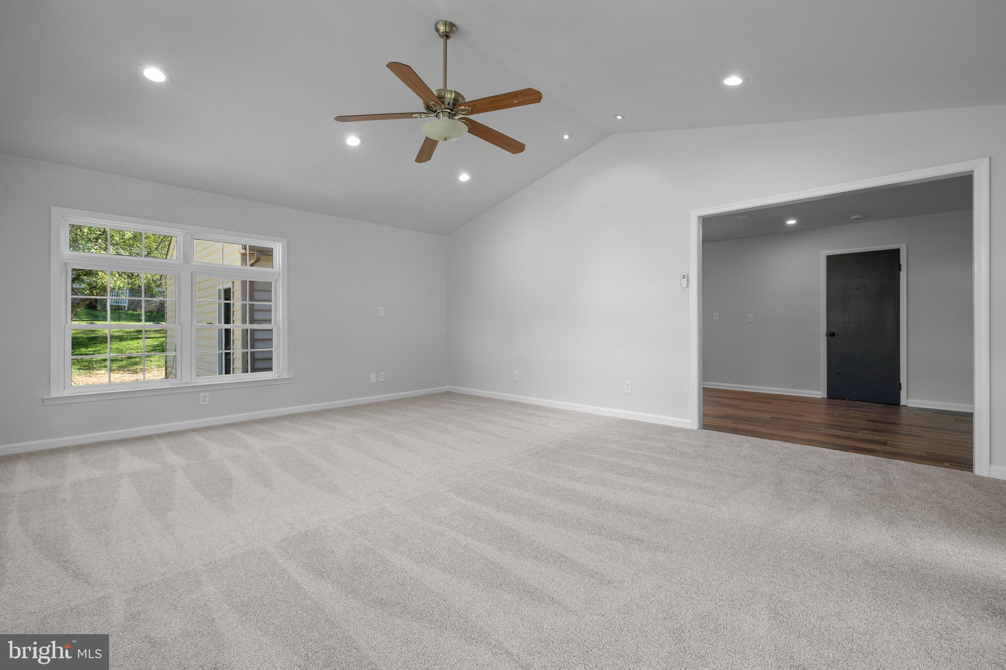 6912 Stratford Drive Sykesville, MD 21784 - Photo 12 of 46 a view of an empty room with a window