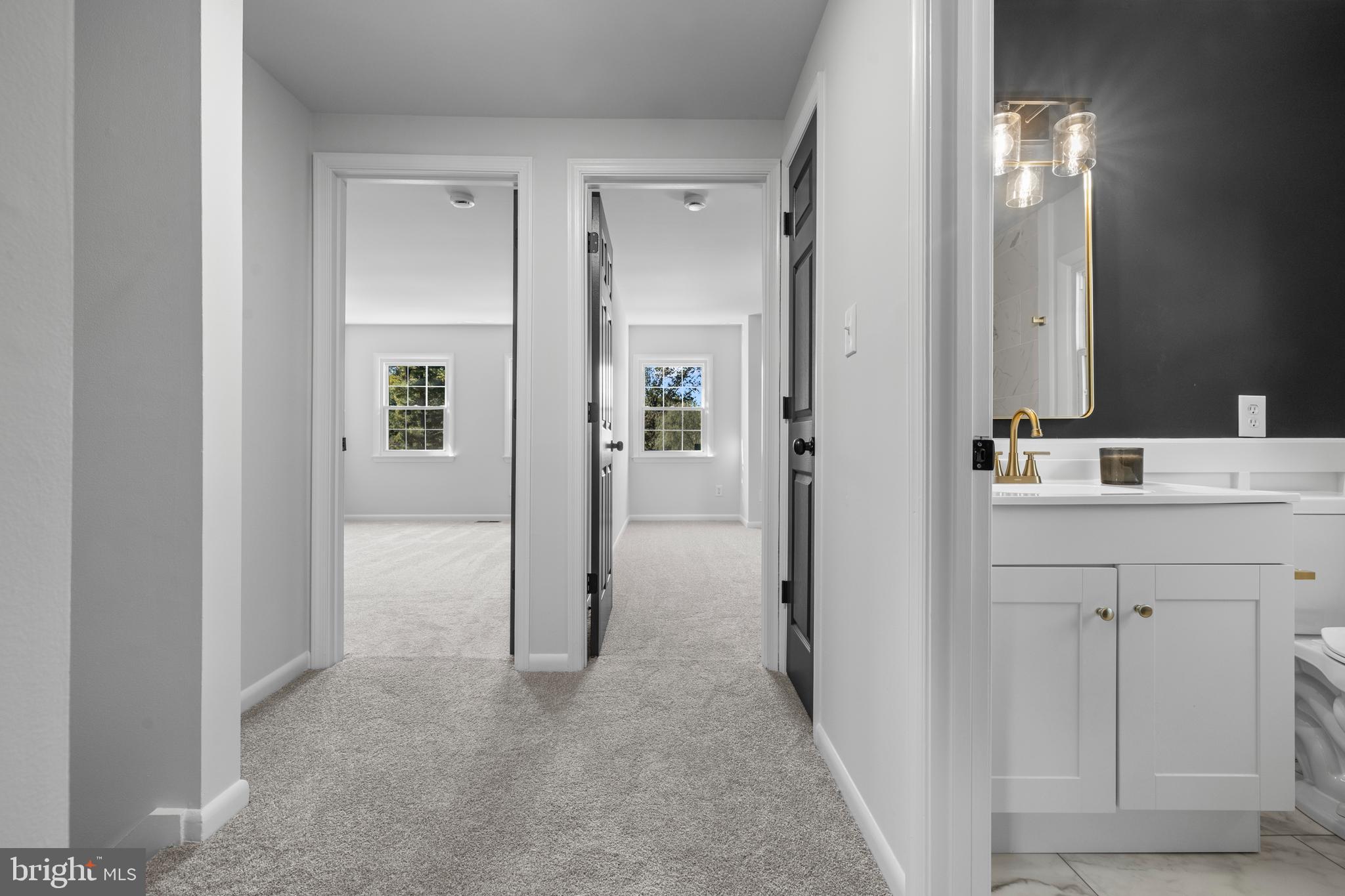 6912 Stratford Drive Sykesville, MD 21784 - Photo 17 of 46 a bathroom with a sink and a mirror
