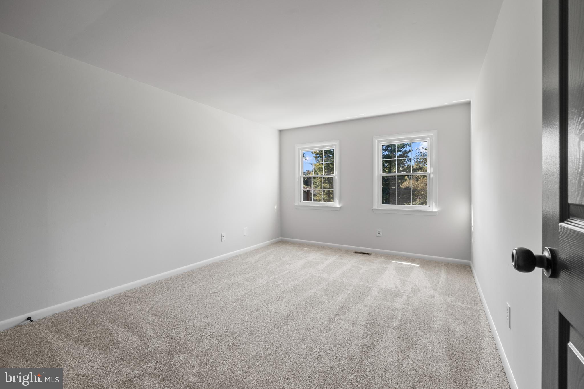 6912 Stratford Drive Sykesville, MD 21784 - Photo 18 of 46 an empty room with windows