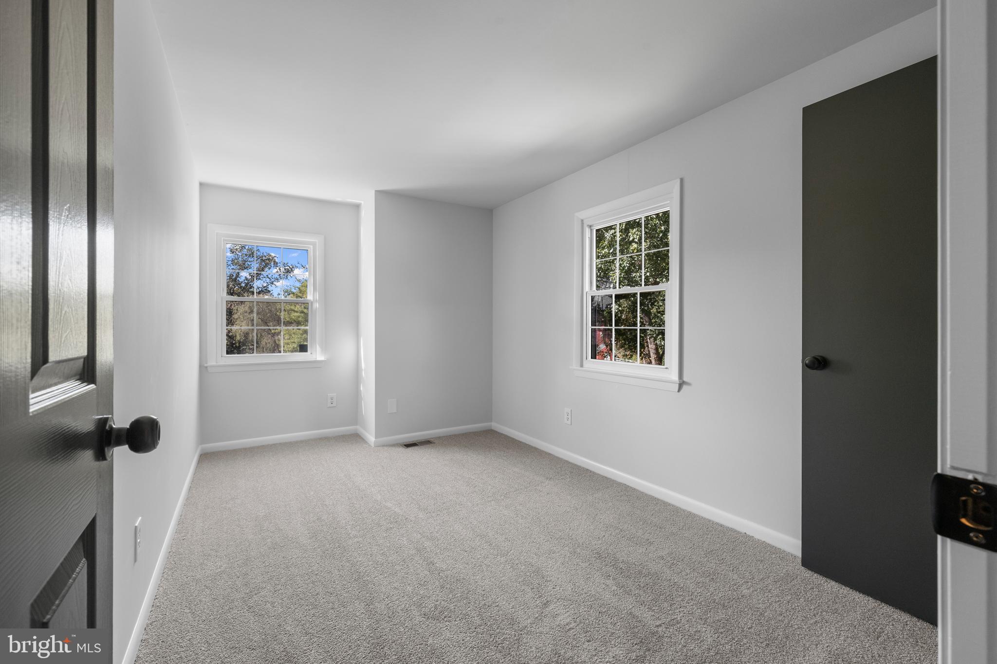 6912 Stratford Drive Sykesville, MD 21784 - Photo 20 of 46 an empty room with windows