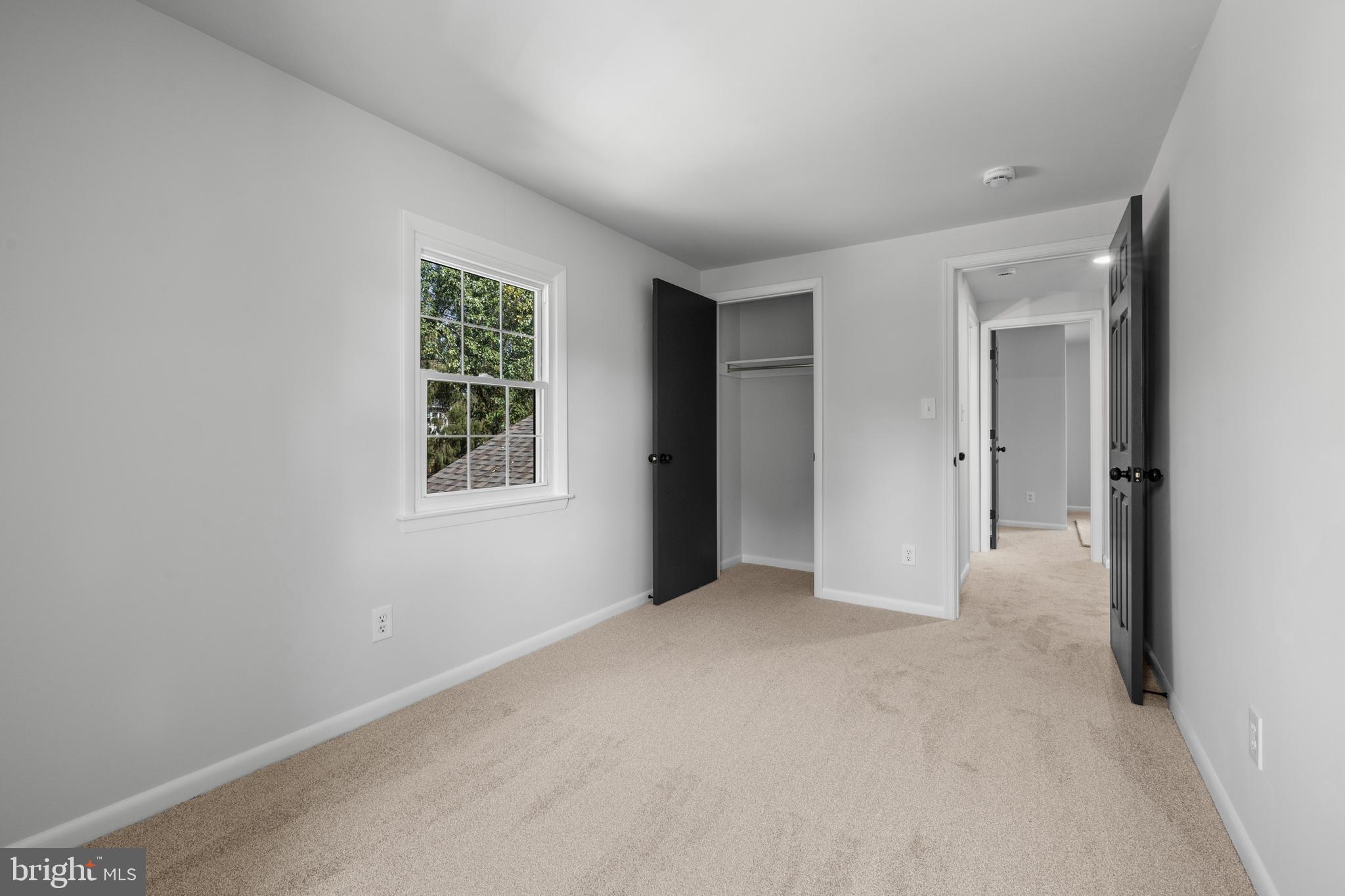 6912 Stratford Drive Sykesville, MD 21784 - Photo 21 of 46 a view of an empty room with a window