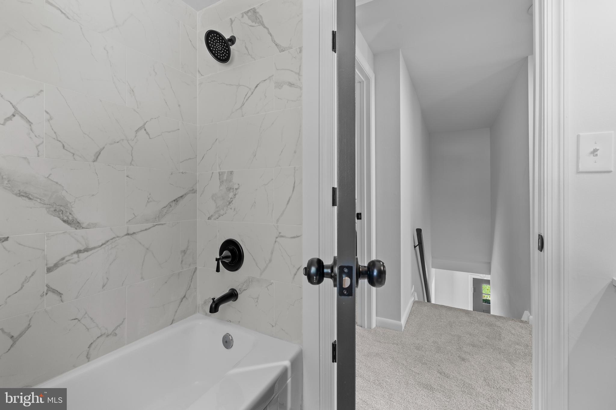 6912 Stratford Drive Sykesville, MD 21784 - Photo 22 of 46 a bathroom with a tub