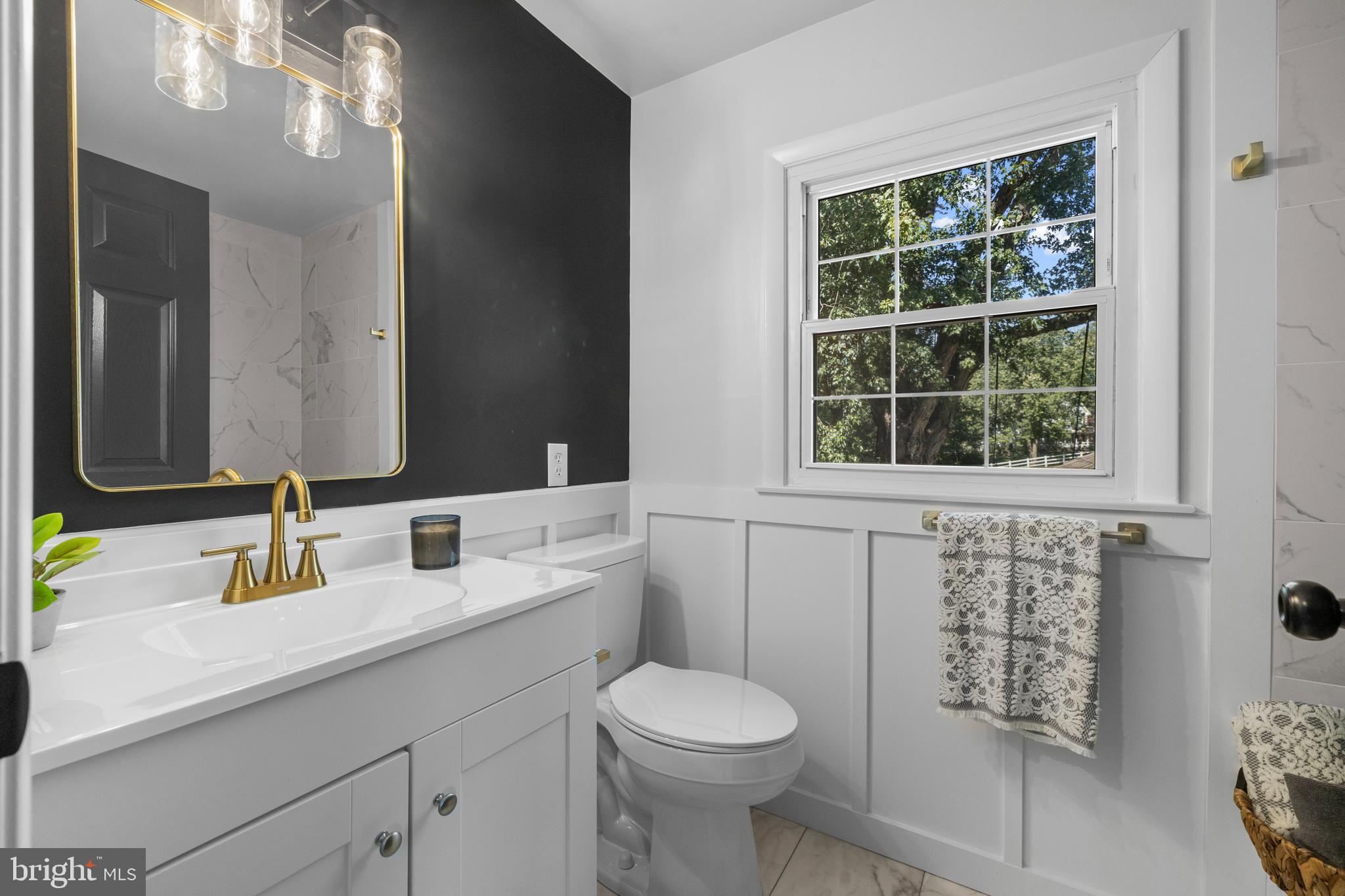 6912 Stratford Drive Sykesville, MD 21784 - Photo 23 of 46 a bathroom with a sink toilet and shower