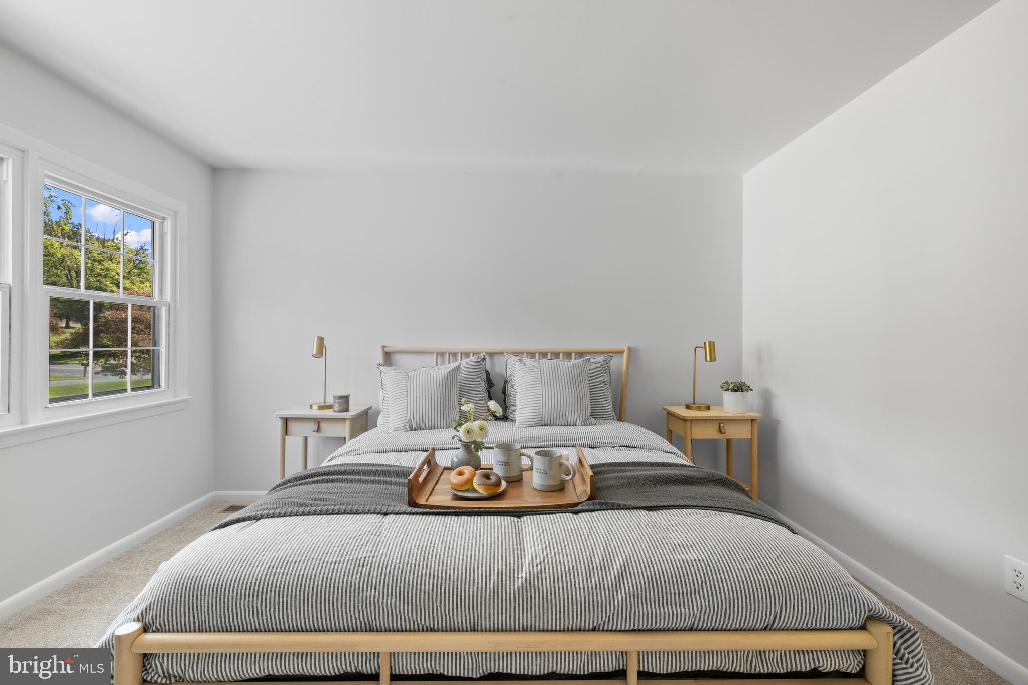 6912 Stratford Drive Sykesville, MD 21784 - Photo 26 of 46 a bedroom with a bed and window