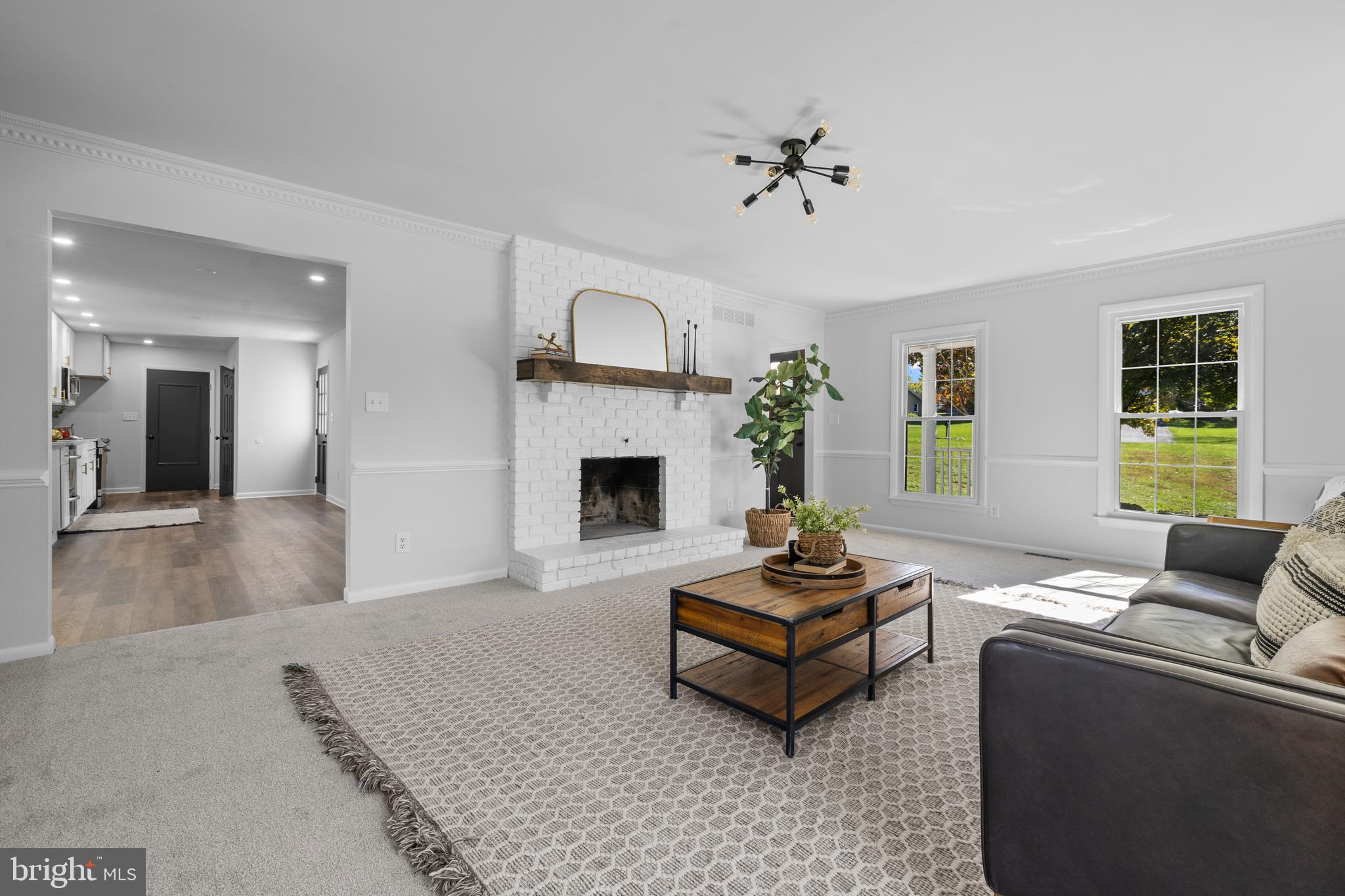 6912 Stratford Drive Sykesville, MD 21784 - Photo 3 of 46 a living room with furniture and a fireplace