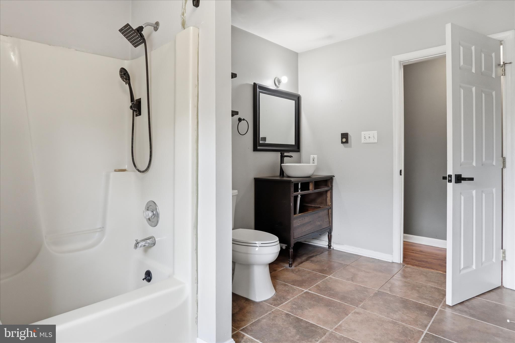 13733 Barnhart Road Clear Spring, MD 21722 - Photo 12 of 32 a bathroom with a shower toilet and a sink